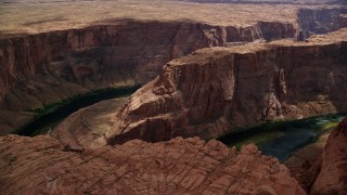 5.5K aerial stock footage of Horseshoe Bend, and Colorado River in the deep Glen Canyon, Arizona Aerial Stock Footage | AX131_218