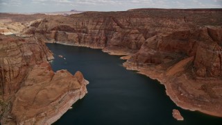 5.5K aerial stock footage of flying over Lake Powell canyons in Navajo Canyon, Arizona Aerial Stock Footage | AX131_232E