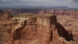 5.5K aerial stock footage of flying by row of large buttes, Navajo Nation Reservation, Arizona Aerial Stock Footage | AX132_009E