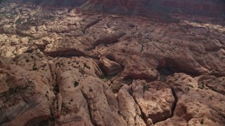 5.5K aerial stock footage of flying by a narrow canyon, Navajo Nation Reservation, Utah Aerial Stock Footage | AX132_065E