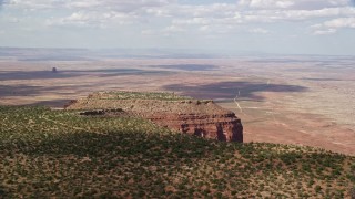 5.5K aerial stock footage of flying by desert mesa, revealing second mesa, Navajo Nation Reservation, Arizona, Utah Aerial Stock Footage | AX132_121E