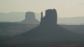 5.5K aerial stock footage of West Mitten Butte in Monument Valley, Utah, Arizona, twilight Aerial Stock Footage | AX133_026E