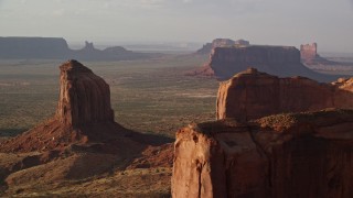 5.5K aerial stock footage of Gray Whiskers Butte in Monument Valley, Utah, Arizona, twilight Aerial Stock Footage | AX133_076E