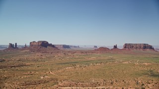 5.5K aerial stock footage of several desert buttes and mesas in famous Monument Valley, Utah, Arizona Aerial Stock Footage | AX135_092