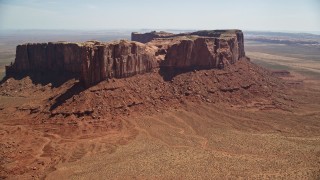 5.5K aerial stock footage of passing Meridian Butte in Monument Valley, Utah, Arizona Aerial Stock Footage | AX135_167