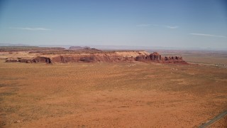 5.5K aerial stock footage of approaching Oljeto Mesa and Rock Door Mesa in Navajo Nation Reservation, Utah, Arizona Aerial Stock Footage | AX135_195