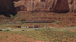 AX135_206 - 5.5K aerial stock footage of flying low by Goulding's Lodge and Goulding's Store, Goulding, Utah