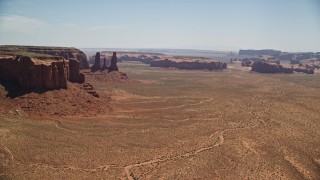 5.5K aerial stock footage flyby buttes and mesas, revealing Elephant Butte in Monument Valley, Utah, Arizona Aerial Stock Footage | AX136_014E