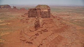 5.5K aerial stock footage of approaching giant desert buttes in Monument Valley, Utah, Arizona Aerial Stock Footage | AX136_040E