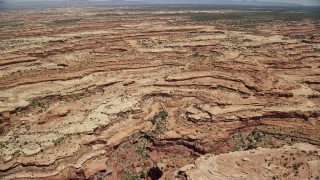 5.5K aerial stock footage of flying over mesas and a canyon, Cedar Mesa, Utah Aerial Stock Footage | AX136_061