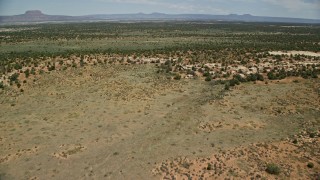 5.5K aerial stock footage of flying over Slick Horn Road and desert valley, Cedar Mesa, Utah Aerial Stock Footage | AX136_075E