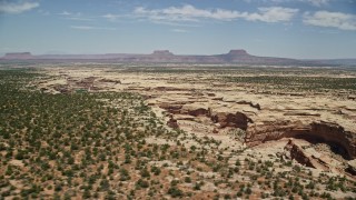 5.5K aerial stock footage of orbiting the Grand Gulch canyon, Grand Gulch Primitive Area, Utah Aerial Stock Footage | AX136_080E