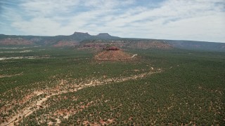 5.5K aerial stock footage of flying toward a butte, mesas, State Route 275 in Manti-La Sal National Forest, Utah Aerial Stock Footage | AX136_126E