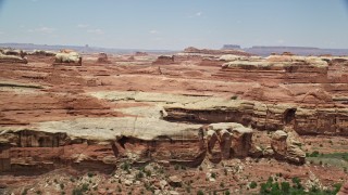 5.5K aerial stock footage of passing desert rock walls and narrow canyons, Canyonlands National Park, Utah Aerial Stock Footage | AX136_218