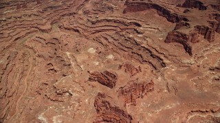 5.5K aerial stock footage of a bird's eye view of rugged canyons, buttes, Canyonlands National Park, Utah Aerial Stock Footage | AX136_248E