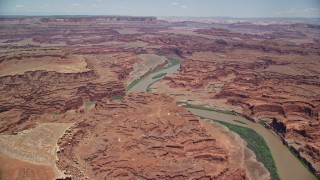 5.5K aerial stock footage of flying toward the Colorado River in Meander Canyon, Canyonlands National Park, Utah Aerial Stock Footage | AX136_261E