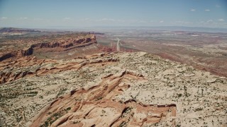 5.5K aerial stock footage of Highway 191 through a desert valley, Moab, Utah Aerial Stock Footage | AX136_283E