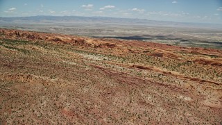 5.5K aerial stock footage fly over rock fins in Devil's Garden, Arches National Park, Utah Aerial Stock Footage | AX137_011E