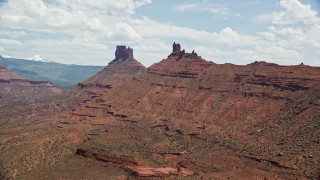 5.5K aerial stock footage of a pair of desert buttes in Moab, Utah Aerial Stock Footage | AX137_127