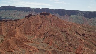 5.5K aerial stock footage of orbiting the red slopes of desert mountains in Moab, Utah Aerial Stock Footage | AX137_153E