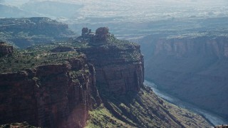 5.5K aerial stock footage of cliff top buttes overlooking Colorado River, Arches National Park, Utah Aerial Stock Footage | AX138_029