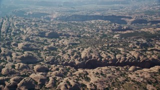 5.5K aerial stock footage of a view of petrified sand dune rock formations at Sand Flats Recreation Area, Utah Aerial Stock Footage | AX138_038E