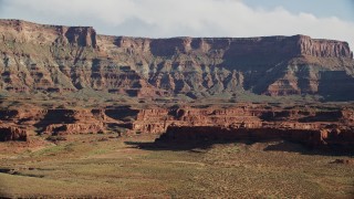 5.5K aerial stock footage of a tall desert mesa, Moab, Utah Aerial Stock Footage | AX138_069