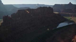 AX138_079E - 5.5K aerial stock footage following Colorado River through Goose Neck in Meander Canyon, Canyonlands National Park, Utah