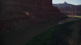 AX138_091E - 5.5K aerial stock footage low flyover of the Colorado River through Goose Neck in Meander Canyon, Canyonlands National Park, Utah