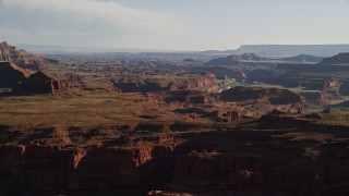 5.5K aerial stock footage of passing Pyramid Butte and Meander Canyon in Canyonlands National Park, Utah Aerial Stock Footage | AX138_112