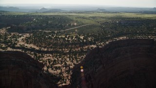 5.5K aerial stock footage approach Grand View Point Road from Shafer Canyon in Canyonlands National Park, Utah Aerial Stock Footage | AX138_121