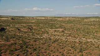 5.5K aerial stock footage of a wide view of the open desert in Canyonlands National Park, Utah Aerial Stock Footage | AX138_145