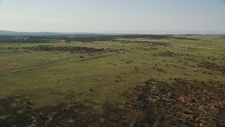 AX138_147 - 5.5K aerial stock footage of State Route 313 through Dead Horse Point State Park, Utah