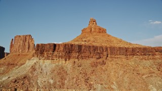 5.5K aerial stock footage of closely orbiting a butte in Moab, Utah Aerial Stock Footage | AX138_191