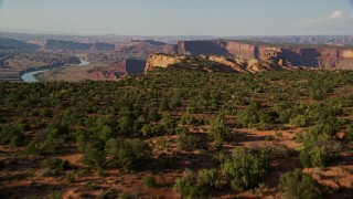 5.5K aerial stock footage fly over desert mesa to reveal Colorado River, Moab, Utah Aerial Stock Footage | AX138_197E