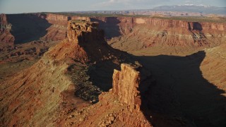 5.5K aerial stock footage of orbiting two buttes overlooking wide canyon in Moab, Utah Aerial Stock Footage | AX138_202