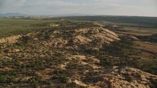 5.5K aerial stock footage of flying by shallow canyon seen from Hatch Point, Moab, Utah Aerial Stock Footage | AX138_238E