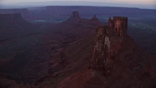 5.5K aerial stock footage orbit Castleton Tower in Moab, Utah, at sunset Aerial Stock Footage | AX138_417E