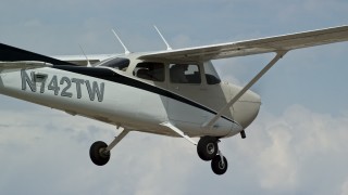 AX139_136 - 5.5K aerial stock footage close-up of Cessna's cockpit while flying high above desert, Emery County, Utah