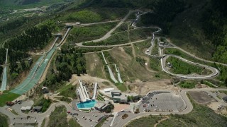 AX140_218E - 5.5K aerial stock footage of the aerials pool and ski jumps at Utah Olympic Park