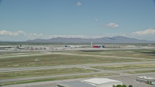 5.5K aerial stock footage of the control tower at Salt Lake City International Airport, Utah Aerial Stock Footage | AX140_265E