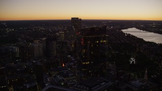 5.5K aerial stock footage flying by Millennium Tower, Downtown Boston, Back Bay, Massachusetts, twilight Aerial Stock Footage | AX141_028