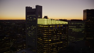 5.5K aerial stock footage of Russia Wharf, Federal Reserve Bank, Downtown Boston, Massachusetts, twilight Aerial Stock Footage | AX141_035