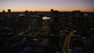 5.5K aerial stock footage approaching skyscrapers over city streets, Downtown Boston, Massachusetts, twilight Aerial Stock Footage | AX141_051E