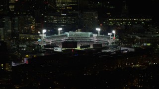 5.5K aerial stock footage flying by baseball game in progress, Fenway Park, Boston, Massachusetts, night Aerial Stock Footage | AX141_083