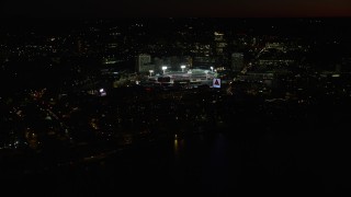 5.5K aerial stock footage flying by baseball game in progress at Fenway Park, Boston, Massachusetts, night Aerial Stock Footage | AX141_084E