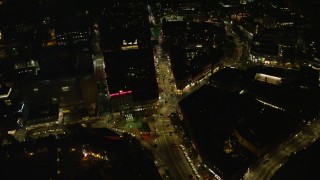 5.5K aerial stock footage of a bird's eye view over Harvard Square, Massachusetts Avenue, Harvard University, Massachusetts, night Aerial Stock Footage | AX141_104