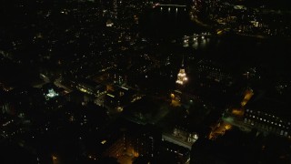 AX141_122E - 5.5K aerial stock footage orbiting Lowell House, Adams House, Mt Auburn Street, Harvard University, Massachusetts, night