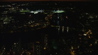 5.5K aerial stock footage of John W. Weeks Bridge and Anderson Memorial Bridge, Harvard University, Massachusetts, night Aerial Stock Footage | AX141_126