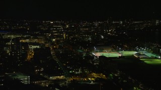 AX141_144E - 5.5K aerial stock footage flying by Massachusetts Institute of Technology, Cambridge, Massachusetts, night